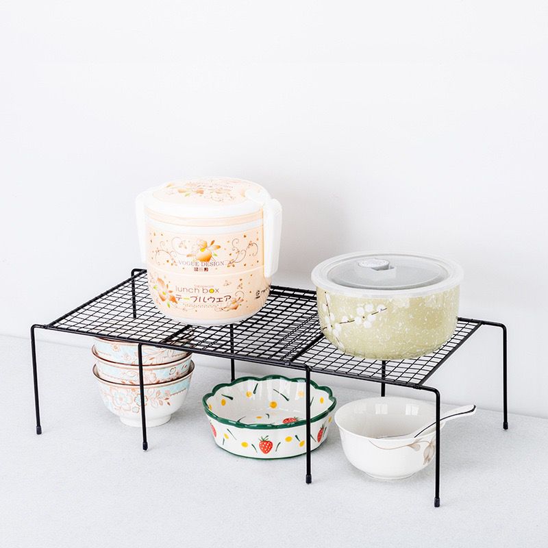 Expandable shelf raiser