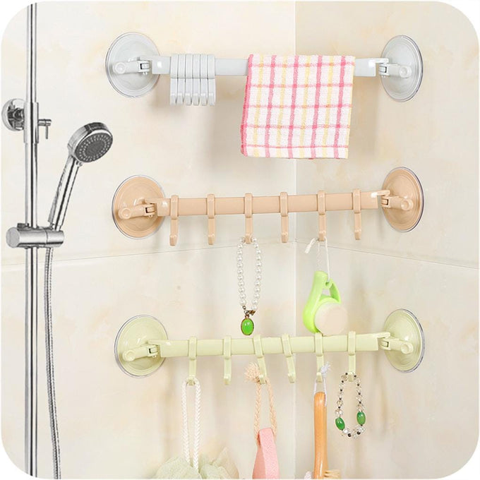 Simple 6 hooks hanger which sticks by suction