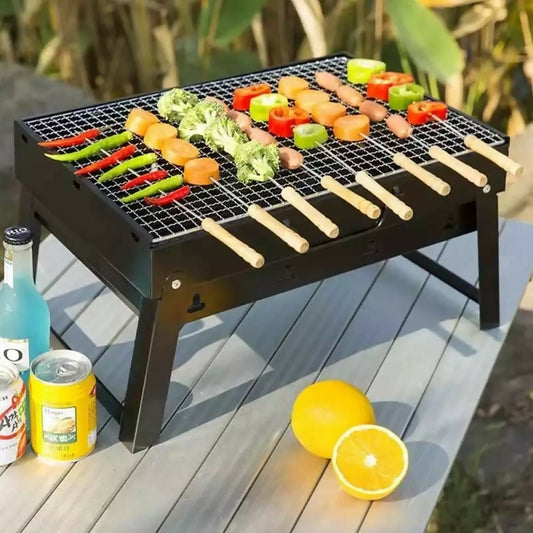 Foldable and portable barbecue charcoal grill