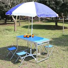 Portable Outdoor Aluminum folding table with 4 Chairs and an umbrella