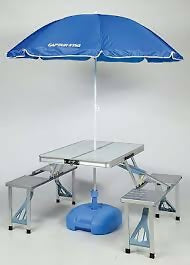 Portable Outdoor Aluminum folding table with 4 Chairs and an umbrella