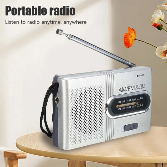 NEW Portable Mini Radio Handheld Dual Band AM FM Music Player Speaker with Telescopic Antenna Outdoor Radio Stereo