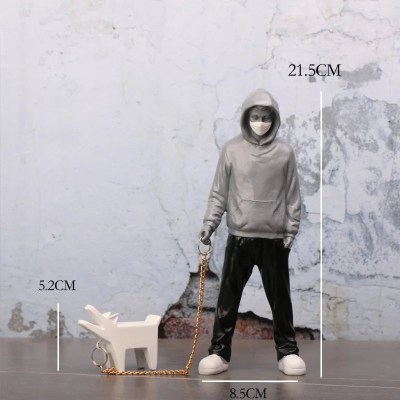 Banksy a trendy man playing with dogs, white fashion toys, art sculptures and ornaments