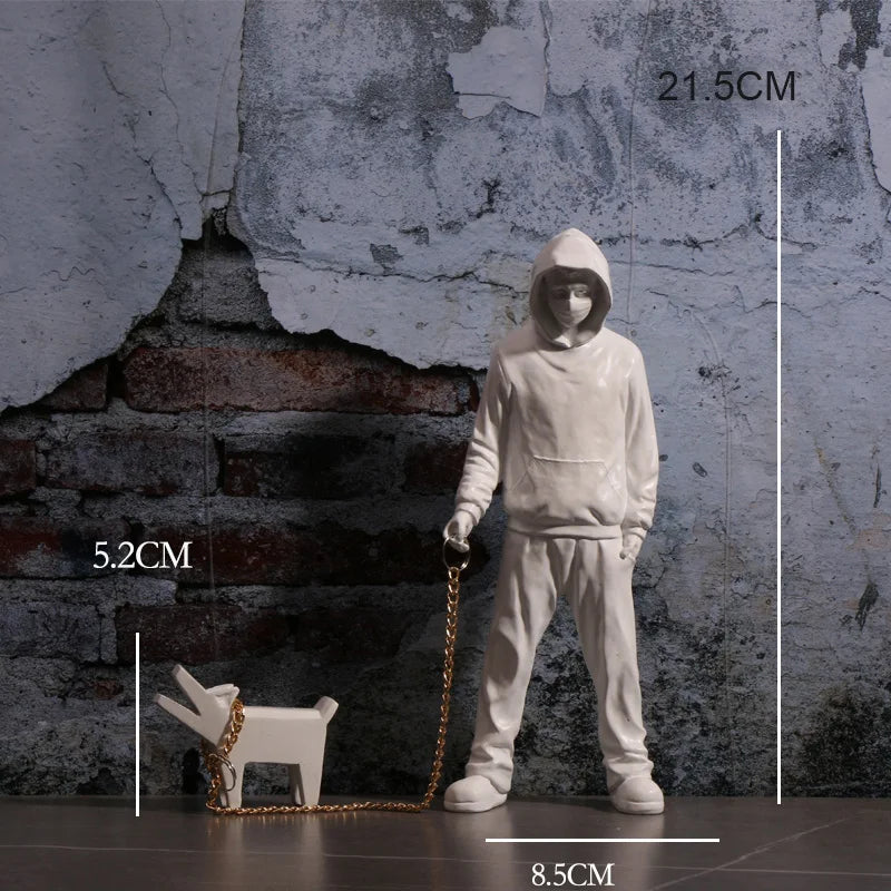 Banksy a trendy man playing with dogs, white fashion toys, art sculptures and ornaments