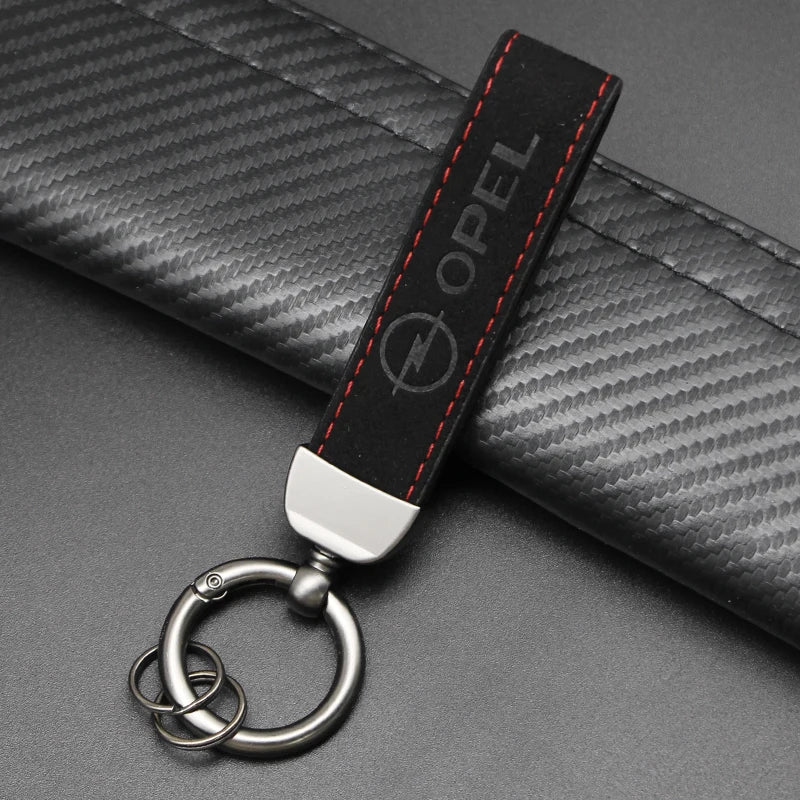 1Pcs Metal/Leather Car Keychain Badge Emblem For Opel Astra GTC Insignia Antara Meriva Zafira Key Chain Rings Auto Accessories