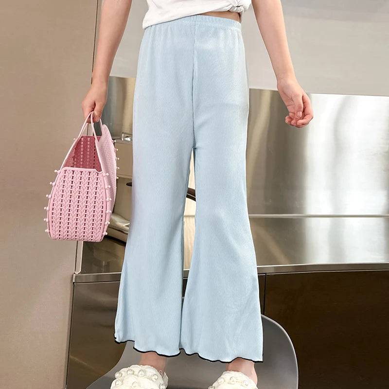 Children's solid color bell bottoms girls summer color casual fashion pants female students elastic waist pants with wavy sides.