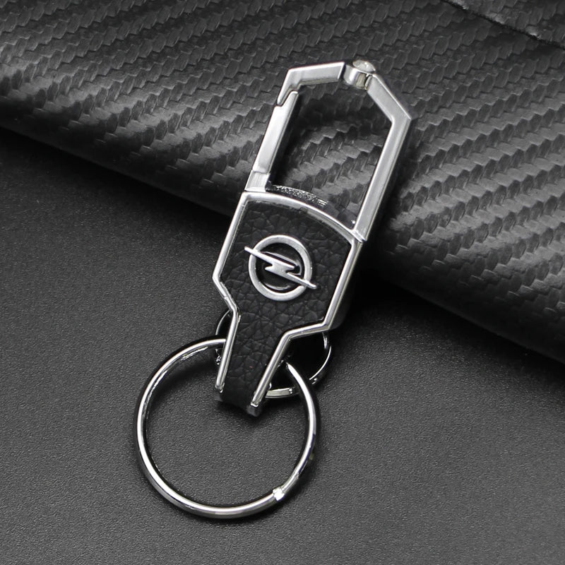 1Pcs Metal/Leather Car Keychain Badge Emblem For Opel Astra GTC Insignia Antara Meriva Zafira Key Chain Rings Auto Accessories