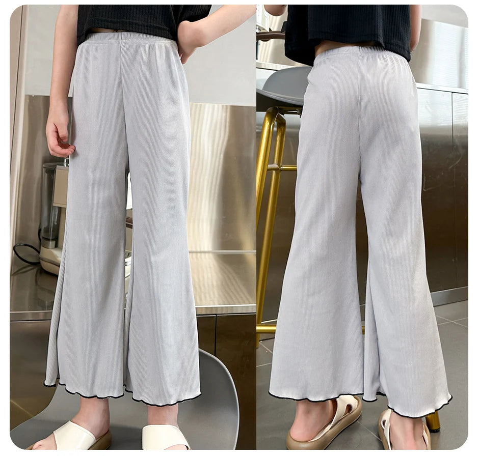 Children's solid color bell bottoms girls summer color casual fashion pants female students elastic waist pants with wavy sides.