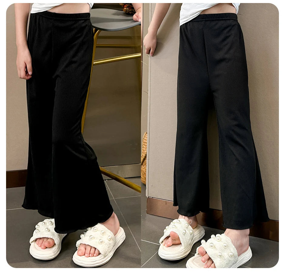 Children's solid color bell bottoms girls summer color casual fashion pants female students elastic waist pants with wavy sides.