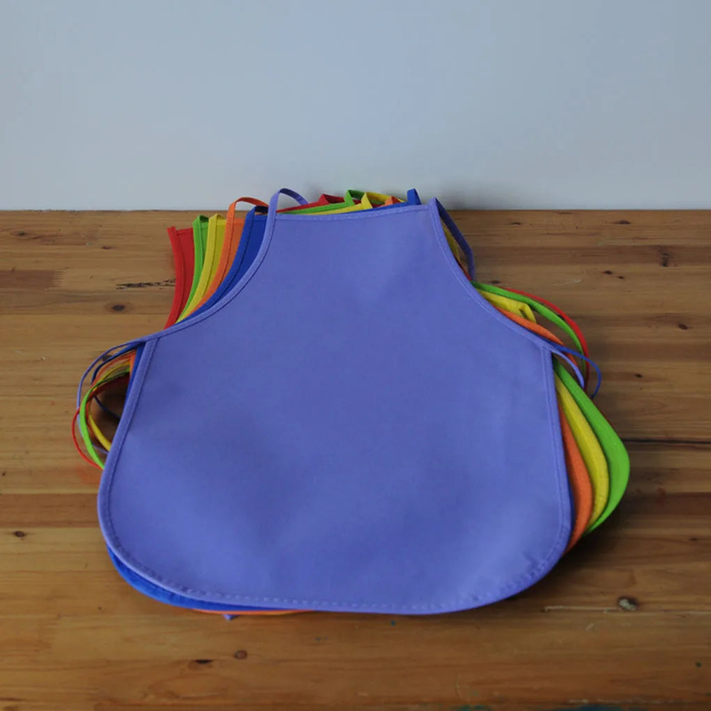 12Pcs Kids Colorful Children Aprons Non-Woven Fabric Art Waterproof Apron Bib Baby Work Kindergarten School Activities
