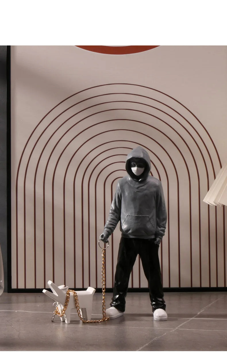 Banksy a trendy man playing with dogs, white fashion toys, art sculptures and ornaments