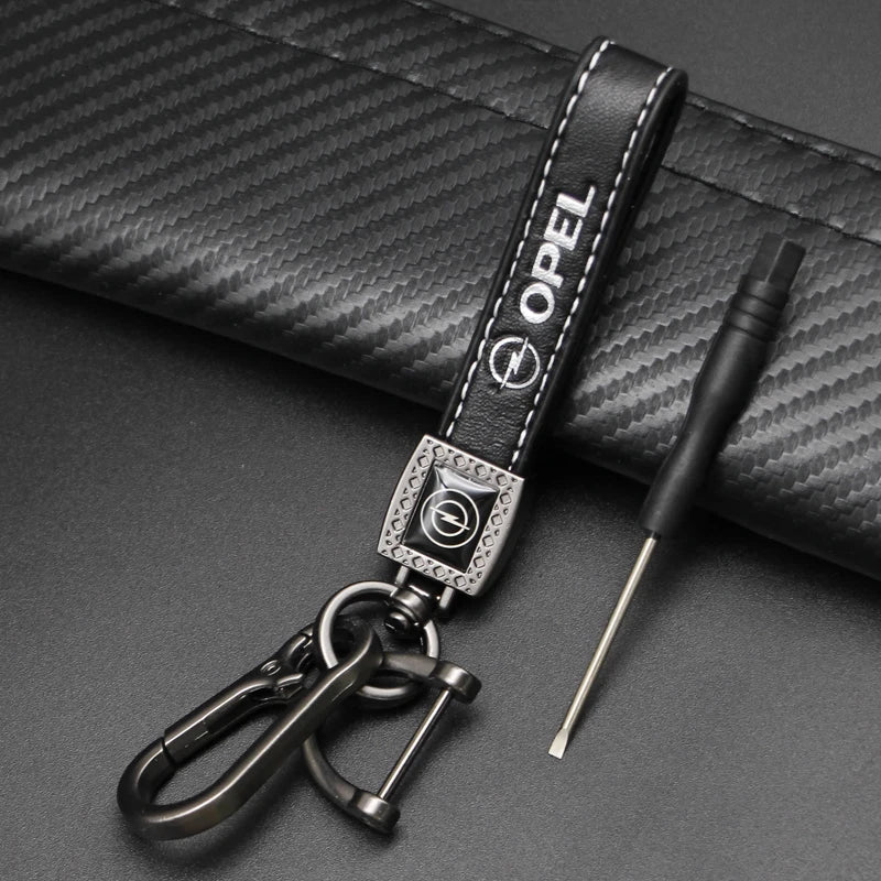 1Pcs Metal/Leather Car Keychain Badge Emblem For Opel Astra GTC Insignia Antara Meriva Zafira Key Chain Rings Auto Accessories