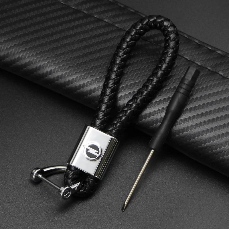 1Pcs Metal/Leather Car Keychain Badge Emblem For Opel Astra GTC Insignia Antara Meriva Zafira Key Chain Rings Auto Accessories