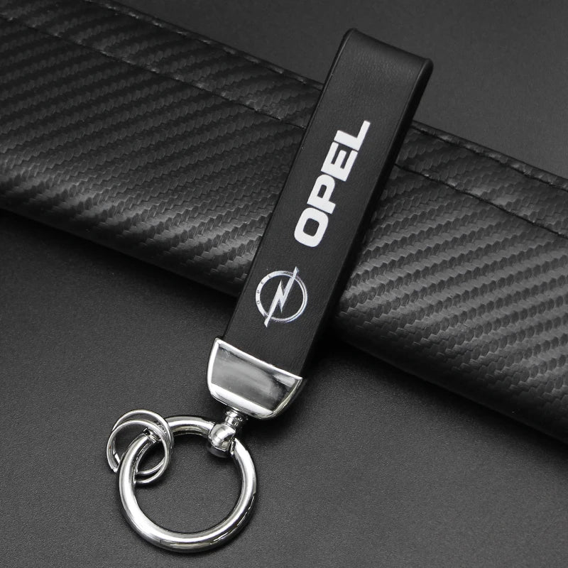 1Pcs Metal/Leather Car Keychain Badge Emblem For Opel Astra GTC Insignia Antara Meriva Zafira Key Chain Rings Auto Accessories