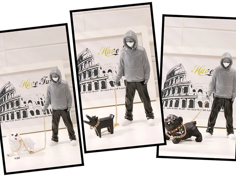 Banksy a trendy man playing with dogs, white fashion toys, art sculptures and ornaments