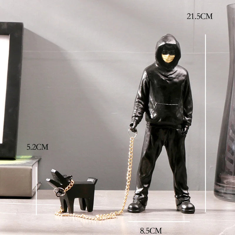 Banksy a trendy man playing with dogs, white fashion toys, art sculptures and ornaments
