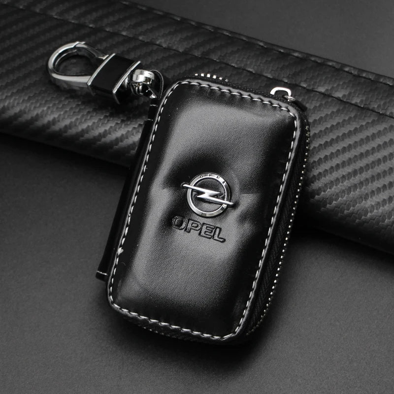 1Pcs Metal/Leather Car Keychain Badge Emblem For Opel Astra GTC Insignia Antara Meriva Zafira Key Chain Rings Auto Accessories