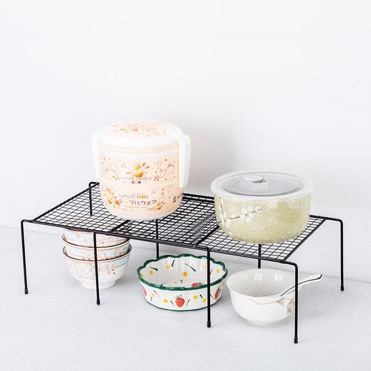 Expandable shelf raiser